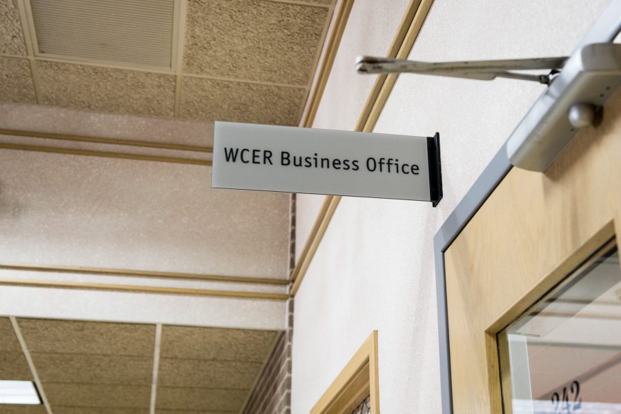Sign above door reading, "WCER Business Office".