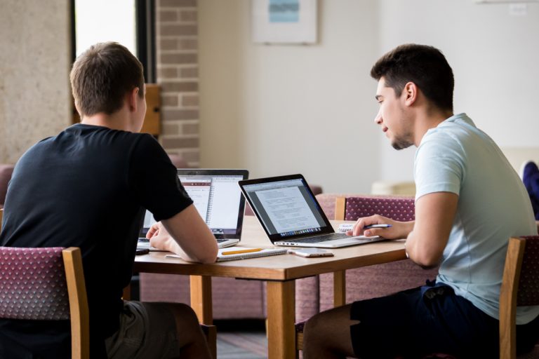college students studying in the library